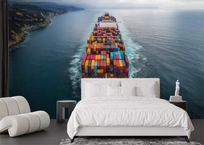 massive container ship laden with colorful cargo containers navigating vast ocean waters aerial view emphasizes scale and international commerce showcasing global trade dynamics Wall mural