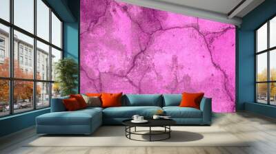 Pink old concrete wall with many long cracks. Urban style. Wall mural