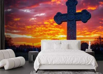 silhouette of ornate cross against a radiant sunset sky solemn gathering of worshippers below symbolizing unity and reverence on holy cross day Wall mural