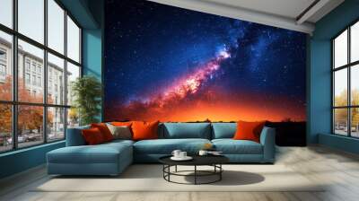 starry night sky milky way stretching across darkness silhouetted landscape long exposure astrophotography style Wall mural