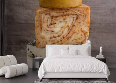 Table decoration of different flavors of cheese Wall mural