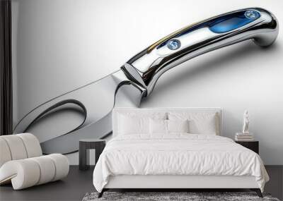 A shiny, chrome-finished fork with a curved prong for serving. Wall mural