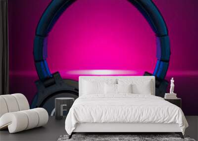 Gamer Headphones Dark Background and colorful pink Light. Wall mural