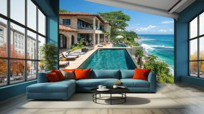 Luxurious villa overlooking the ocean with a stunning pool. Wall mural