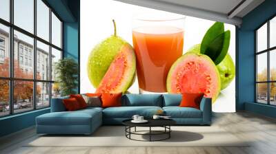 Guava juice and peeled fruit on white background. Wall mural