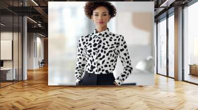 Confident Businesswoman in Modern Office Setting Wearing Stylish Polka Dot Blouse Wall mural