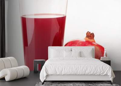 glass of juice and pieces of pomegranate Wall mural