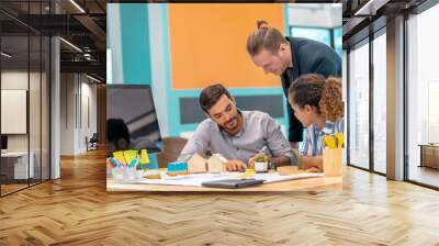 Team of young Real Estate Contractor is brainstorming in office Wall mural