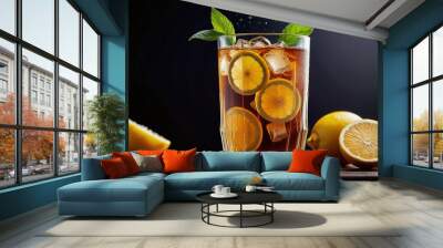 a glass filled with iced tea garnished with fresh lemon slices and mint leaves Wall mural