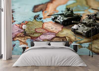 Miniature tanks on a world map board game Wall mural