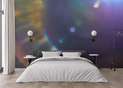 Abstract lens flare on a black background. Wall mural