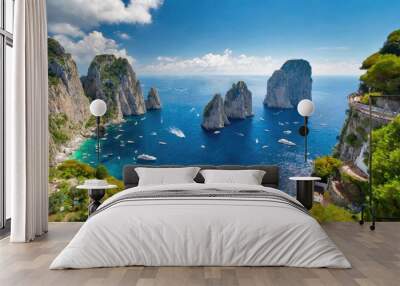 A stunning coastal view of Capri, Italy, with clear blue waters, rocky cliffs, and boats scattered in the sea under a bright sky. Wall mural