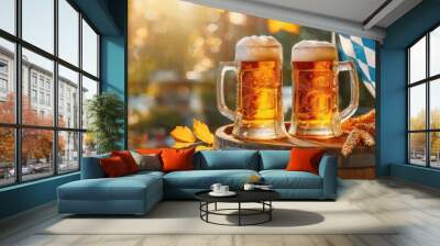 Two frothy beer mugs placed on a wooden barrel with autumn leaves and warm sunlight. Wall mural