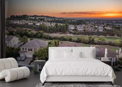 Aerial view of a gorgeous southern California sunset from an upscale neighborhood on a golf course.  Wall mural