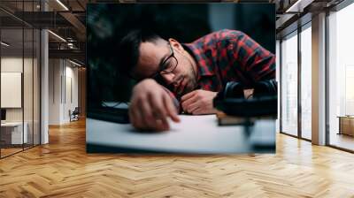 Businessman sleeping on desk. Tired man overworked.  Wall mural