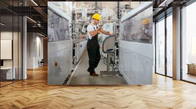 Portrait of worker in factory  Wall mural