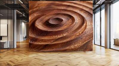 A handcrafted wooden s the smooth surface adorned with a delicate spiral pattern highlighting the rich tones and grains of the wood. Wall mural