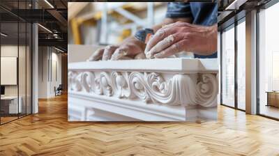 A worker meticulously measures and s ornamental moldings to be installed around windows showcasing the buildings attention to detail. Wall mural