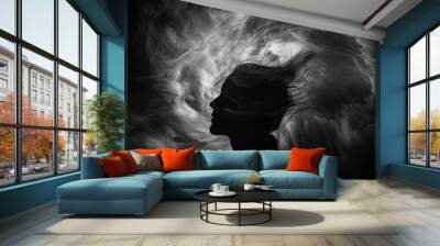 Only the outline of a profile is visible amidst the swirling darkness giving a sense of mystery and intrigue. Black and white art Wall mural