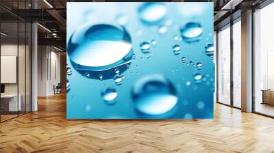 Abstract drops of water on glass reflecting the environment Wall mural