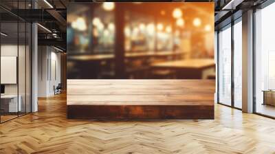 Empty wooden table top with lights bokeh on blur restaurant background Wall mural