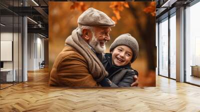 Happy grandpa and grandson on beautiful autumn park, family bonding moment with copy space. Wall mural