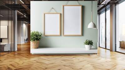 Mock up frame hanging on a light green wall with minimal decoration Wall mural