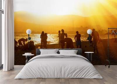 On the beach of Palma de Mallorca - Playa de Palma with silhouettes of people Wall mural