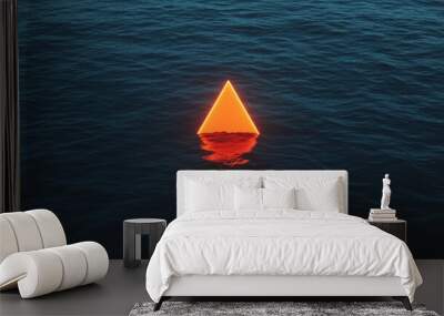 A glowing orange triangle floating in the dark sea, a minimalist composition of simple shapes. Wall mural