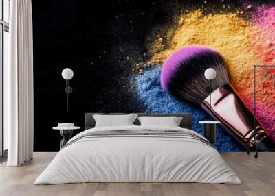 Two makeup brushes with a colorful powder explosion on a black background Wall mural