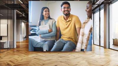 College friends, talking and happy people in school discussion for student scholarship, education and learning together with diversity freedom. Smile of men and women youth talk group in classroom Wall mural