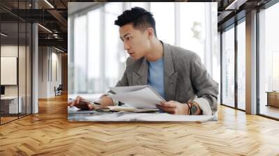 Businessman, writing report and documents with business plan proposal in conference room and company strategy in Japan. Employee focus, Asian man working with notes and pen, development and growth Wall mural