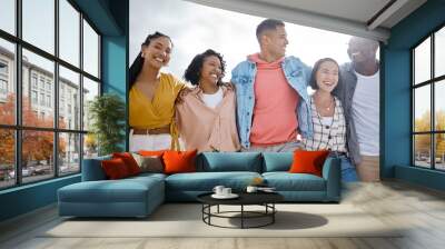 Diversity, happy and friends walking at the beach for holiday, vacation and bonding on sky background space. Men, smile and women group relax at the sea, laugh and cheerful on an ocean trip in Miami Wall mural