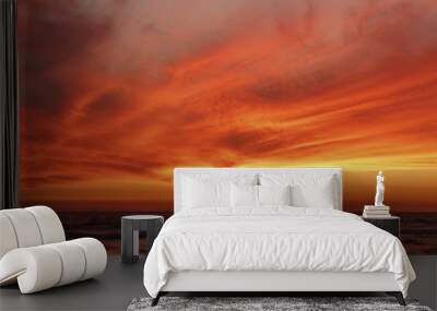 crimson red sunset over the ocean  Wall mural