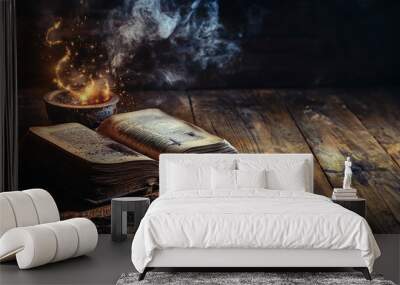 Open old book with bowl for magic spell on old wooden rustic table and room for text  Wall mural