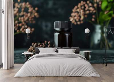 a natural product photo for a black bottle of natural supplement , white pills , ashwagandha in the background Wall mural