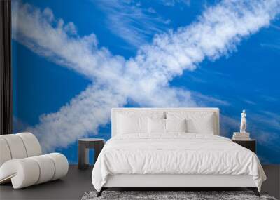 Blue sky with cross clouds on a clear day and good weather in the morning, fluffy and soft white clouds Wall mural