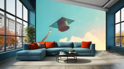 Graduation cap flying high in the sky, symbolizing achievement and new beginnings. Wall mural