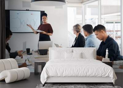 Statistics, presentation and a black woman in a financial meeting, teaching and speaking in a seminar. Planning, strategy and an African boss talking about finance data with business people at work Wall mural