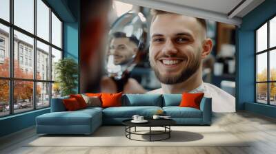 A man is getting his hair cut in a barbershop Wall mural