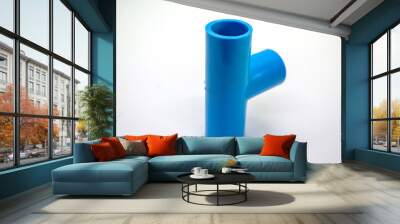 Plastic joints for water pipes on a white background, spare equipment Wall mural