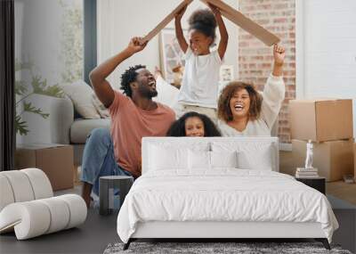 Black family, floor and cardboard roof in home living room with game, laughing and bond with love. Father, mother and daughter with play, relax of box for sign of security in family house with smile Wall mural