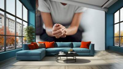 Hands, psychology and mental health with a woman in a therapy session for grief counseling after loss. Anxiety, stress or depression with a female patient feeling nervous in a clinic for support Wall mural