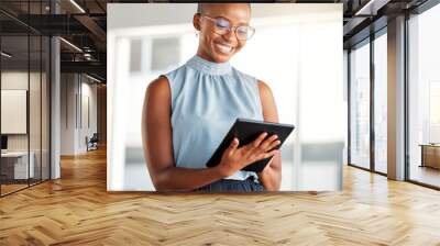 Smile, business tablet and black woman, designer or creative in office online. Touchscreen, technology and African female professional on email app, design research or website, internet or reading. Wall mural