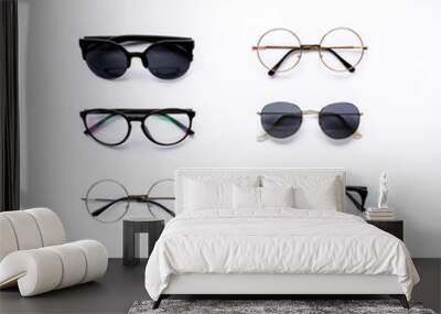 Female sunglasses on white background. Flat lay, top view.  Wall mural