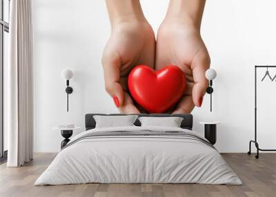 A woman's hand holding a red heart on a transparent background. Healthcare and medicine concept Wall mural