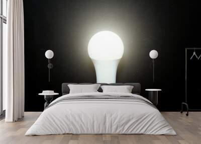 Light bulbs on the dark background, ideas creative concept Wall mural