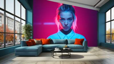 A young blonde woman with an updo hairstyle and white shirt stands facing the camera, neon lights casting dramatic shadows on her face Wall mural