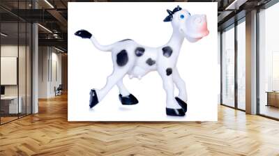 Children's toy figure of a cow on white background isolation Wall mural