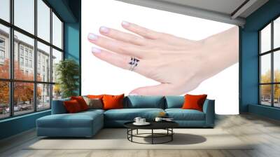 Female hand with silver ring of finger on white background isolation Wall mural